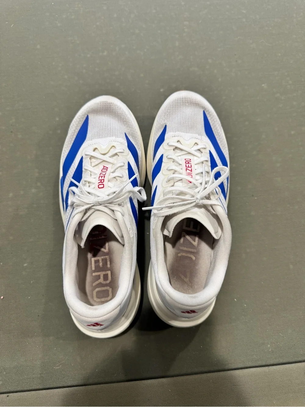 Adidas Evo SL White Sneakers with Royal Blue Stripes